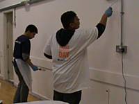 Volunteers hard at work painting the walls of Peopleprint